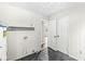 Clean laundry area with neutral color walls, and durable flooring for convenience at 3409 S Rural St, Indianapolis, IN 46237