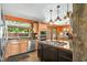 Well-equipped kitchen with stainless steel appliances and adjacent eating area at 3480 W Broadus Dr, North Vernon, IN 47265