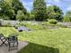 Large backyard featuring a patio area, a garden, and a wood fence, perfect for outdoor activities at 377 4Th E Ct, Carmel, IN 46033