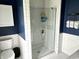 Modern bathroom featuring subway tile, frameless glass shower, and contemporary fixtures at 377 4Th E Ct, Carmel, IN 46033