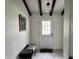 Hallway with bench and a light fixture at 377 4Th E Ct, Carmel, IN 46033
