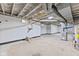 Spacious unfinished basement features exposed beams, and the furnace at 3841 S Sherman Dr, Indianapolis, IN 46237