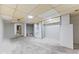 Spacious basement offers built-in shelving, drop ceiling tiles and an adjacent room at 3841 S Sherman Dr, Indianapolis, IN 46237