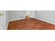 A bright bedroom boasting beautiful hardwood floors and fresh paint at 3841 S Sherman Dr, Indianapolis, IN 46237