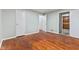 Spacious bedroom features hardwood floors and ample natural light from the window at 3841 S Sherman Dr, Indianapolis, IN 46237