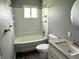Clean bathroom features a shower-tub combo with updated vanity and fixtures at 4004 N Ball Ave, Muncie, IN 47304
