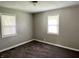 Bedroom with carpet, two windows with blinds, and neutral paint at 4004 N Ball Ave, Muncie, IN 47304