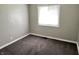Bedroom featuring neutral paint, a window, and carpet at 4004 N Ball Ave, Muncie, IN 47304