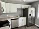 Kitchen featuring stainless steel appliances and white cabinets at 4004 N Ball Ave, Muncie, IN 47304