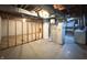 Unfinished basement with exposed ceiling, cement flooring, and some framing work at 403 Us Highway 31 N, Greenwood, IN 46142