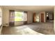 Spacious living room features large windows offering ample natural light and a view of the outdoors at 403 Us Highway 31 N, Greenwood, IN 46142