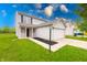 Charming two-story home with a well-manicured lawn and attached two-car garage at 4056 Orchard Valley Ln, Indianapolis, IN 46235