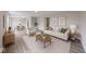 Bright living room features stylish furniture, decor and hardwood flooring at 4056 Orchard Valley Ln, Indianapolis, IN 46235