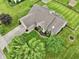 Stunning aerial view of a home with a well-manicured lawn and mature trees at 412 Sonhatsett Dr, Westfield, IN 46074