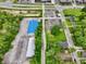 Aerial view of a commercial area featuring various buildings, parking lots, and green spaces at 412 Sonhatsett Dr, Westfield, IN 46074