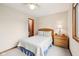 Bedroom featuring a bed, nightstand, a ceiling fan and a window with blinds at 412 Sonhatsett Dr, Westfield, IN 46074