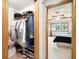 Walk-in closet featuring shelving, storage and a door that opens into the main bedroom at 412 Sonhatsett Dr, Westfield, IN 46074