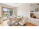 Bright dining area with sliding glass doors that lead to a patio and backyard at 412 Sonhatsett Dr, Westfield, IN 46074