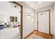 Inviting entryway with hardwood floors transitioning to carpet, leading to the spacious living area at 412 Sonhatsett Dr, Westfield, IN 46074