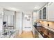 Bright kitchen boasts stainless steel appliances, granite countertops, and ample cabinet space at 412 Sonhatsett Dr, Westfield, IN 46074