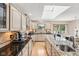 Spacious kitchen with granite countertops, stainless steel appliances and island with sink at 412 Sonhatsett Dr, Westfield, IN 46074