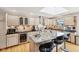 Well-appointed kitchen featuring stainless steel appliances, granite countertops, and ample cabinet space at 412 Sonhatsett Dr, Westfield, IN 46074