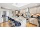 Bright kitchen with stainless steel appliances, center island, and skylight providing natural light at 412 Sonhatsett Dr, Westfield, IN 46074