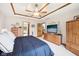 Large main bedroom with a decorative ceiling and access to ensuite bathroom at 412 Sonhatsett Dr, Westfield, IN 46074