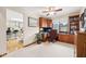 Spacious home office with wood built-ins and adjacent to the kitchen at 412 Sonhatsett Dr, Westfield, IN 46074