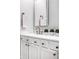 Elegant bathroom vanity with marble countertop, stylish faucet, and decor at 435 Virginia Ave # 106, Indianapolis, IN 46203