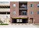 Brick building exterior with car park access and street view at 435 Virginia Ave # 106, Indianapolis, IN 46203