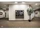 Building hallway with directory and decor, leading to various suites at 435 Virginia Ave # 106, Indianapolis, IN 46203