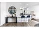 Modern kitchen with breakfast bar, sleek countertops, and stylish pendant lighting at 435 Virginia Ave # 106, Indianapolis, IN 46203