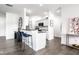 Well-lit kitchen featuring a breakfast bar, modern appliances, and stylish design at 435 Virginia Ave # 106, Indianapolis, IN 46203