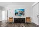 Stylish living area featuring modern art, elegant chairs, and neutral decor at 435 Virginia Ave # 106, Indianapolis, IN 46203