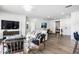 Spacious living room with hardwood floors, comfortable seating, and access to other rooms at 435 Virginia Ave # 106, Indianapolis, IN 46203
