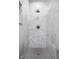 Contemporary shower with marble tile, a rain shower head, and stylish fixtures at 435 Virginia Ave # 106, Indianapolis, IN 46203
