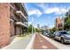 Apartment building exterior on a charming street with downtown city views beyond at 435 Virginia Ave # 106, Indianapolis, IN 46203