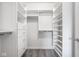 Bright walk-in closet features shelving, drawers, and ample storage space at 435 Virginia Ave # 106, Indianapolis, IN 46203