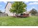 Expansive backyard featuring a large deck perfect for entertaining at 4689 Muscatine Way, Westfield, IN 46062