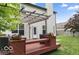 Cozy backyard deck with ample seating and views of the backyard and pergola at 4689 Muscatine Way, Westfield, IN 46062
