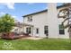 Spacious backyard with a deck, grill, and a well-maintained lawn at 4689 Muscatine Way, Westfield, IN 46062