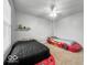 Fun bedroom with two race car beds and a ceiling fan at 4689 Muscatine Way, Westfield, IN 46062