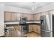Well-appointed kitchen featuring modern stainless steel appliances and stylish countertops at 4689 Muscatine Way, Westfield, IN 46062