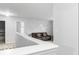 A cozy loft featuring a comfortable seating area and unique wall decor at 4689 Muscatine Way, Westfield, IN 46062