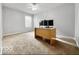 Bright office space with a ceiling fan and a desk perfect for working from home at 4689 Muscatine Way, Westfield, IN 46062