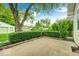 Cozy backyard featuring a private patio area and lush greenery providing a serene outdoor space at 5148 Crittenden Ave, Indianapolis, IN 46205