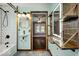 Updated bathroom with modern subway tile and custom wood accents at 5148 Crittenden Ave, Indianapolis, IN 46205