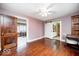 Spacious bedroom with an ensuite bath and decorative barn door at 5148 Crittenden Ave, Indianapolis, IN 46205