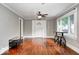 Light-filled living room boasts hardwood floors, neutral walls, and white trim at 5148 Crittenden Ave, Indianapolis, IN 46205